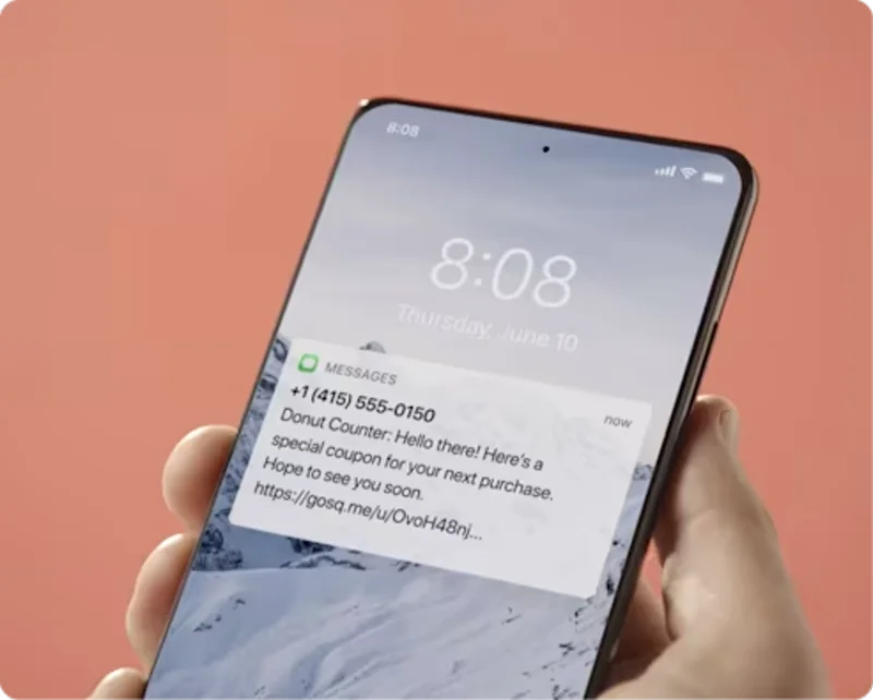 Text message marketing: a coupon text from a donut shop arriving on a customer's phone